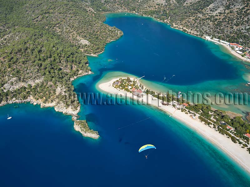 AERIAL VIEW photo of a paraglider above Ölüdeniz, Turkey.