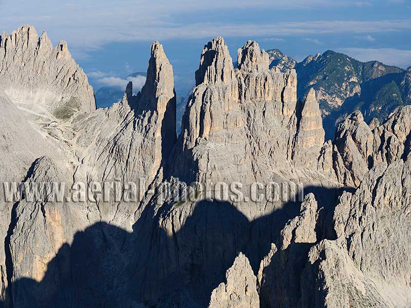 AERIAL VIEW photo of the Vajolet Towers in the Dolomites. Trentino-Alto Adige, Italy.
