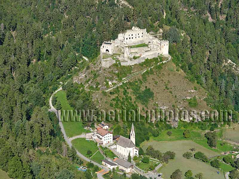 AERIAL VIEW photo of Montechiaro Castle and Church. Trentino-Alto Adige, Italy.