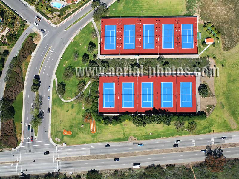 Aerial view of tennis courts alongside PCH1, Malibu, Los Angeles, California, USA.