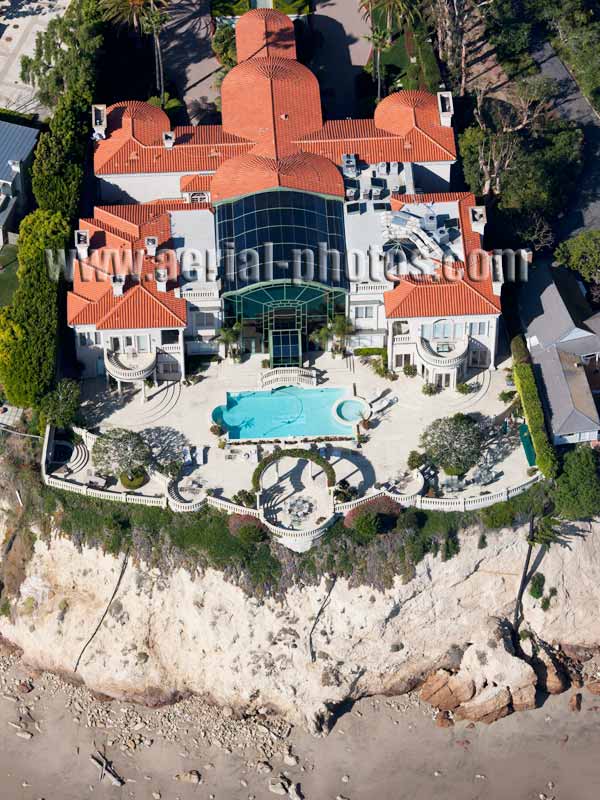 Aerial view of a big house on a coastal cliff, Malibu, Los Angeles, California, USA.