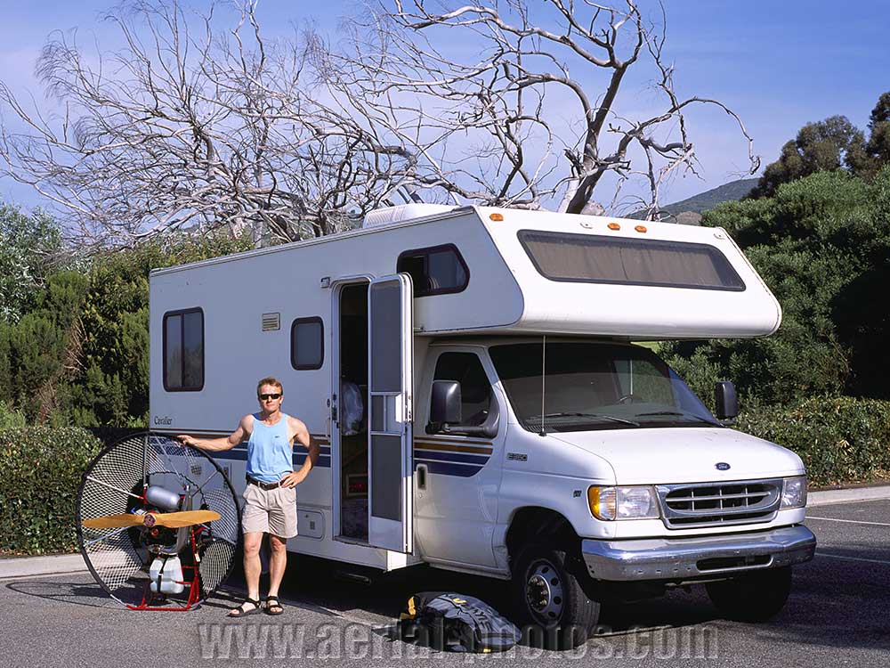 The photographer with his paramotor and camper in California, USA.