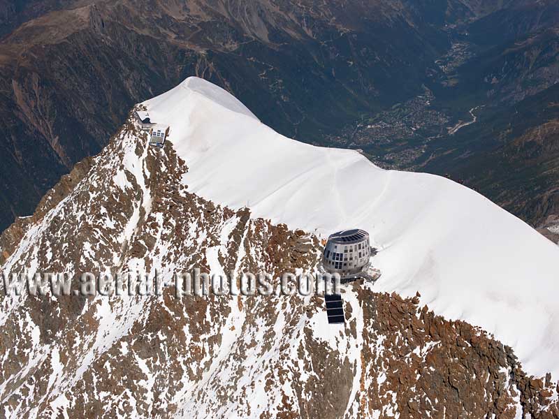 Aerial view. Photo of Aiguille du Goûter, Chamonix Mont-Blanc, Haute-Savoie, Auvergne-Rhône-Alpes, France. Vue aérienne.