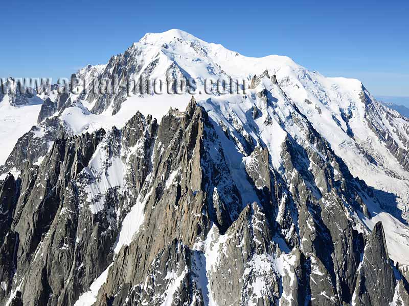AERIAL VIEW photo of Chamonix Needles, Mont-Blanc Massif, Auvergne-Rhône-Alpes, France. VUE AERIENNE Aiguilles de Chamonix.