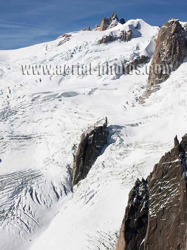 AERIAL VIEW photo of Aiguille du Midi and Vallée Blanche, Chamonix, Haute-Savoie, Auvergne-Rhône-Alpes, France. VUE AERIENNE.