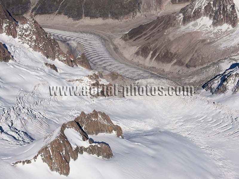 Aerial view. Photo of Mer de Glace and Tacul Glacier, Chamonix Mont-Blanc, Auvergne-Rhône-Alpes, France. Vue aérienne.