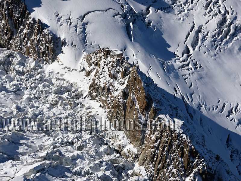 Aerial view. Photo of a mountain hut, Grands Mulets, Chamonix-Mont-Blanc, Haute-Savoie, Auvergne-Rhône-Alpes, France. Vue aérienne.