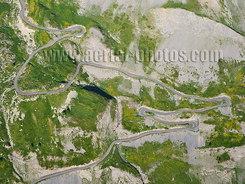 Aerial view. Photo of a winding road near the Col du Galibier, Valloire, Savoie, Auvergne-Rhône-Alpes, France. Vue aérienne.