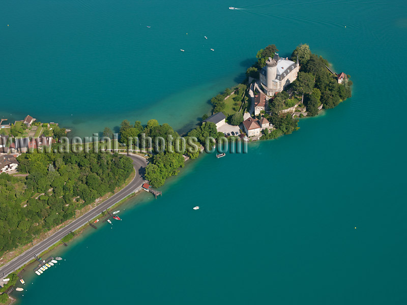 Aerial view. Photo of Duingt Castle, Lake Annecy, Haute-Savoie, Auvergne-Rhône-Alpes, France. Vue aérienne, Château de Duingt, Lac Annecy.