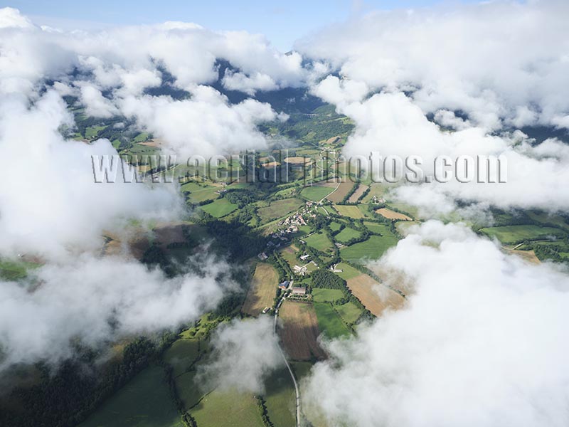 Aerial photo of Percy from above a sea of clouds, Isère, Auvergne-Rhône-Alpes, France. Vue aérienne.
