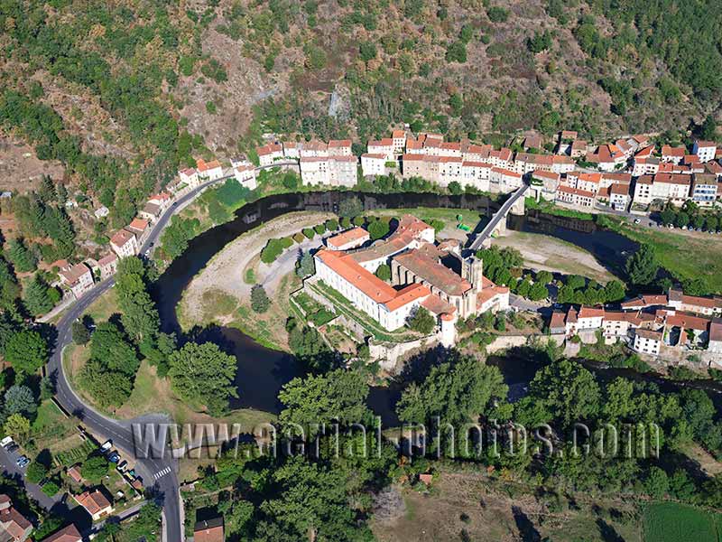 Aerial view. Photo of a priory in Lavoûte-Chilhac, Haute-Loire, Auvergne-Rhône-Alpes, France. Vue aérienne.