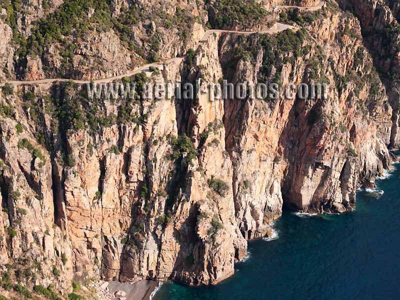 AERIAL VIEW photo of a vertiginous road, Porto, Corsica, France. VUE AERIENNE d'une route vertigineuse, Corse.