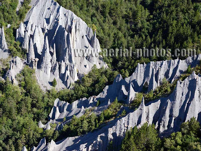 Aerial view, hoodoos or pinnacles, Théus, Alps, France. VUE AERIENNE cheminées de fées, demoiselles coiffées.