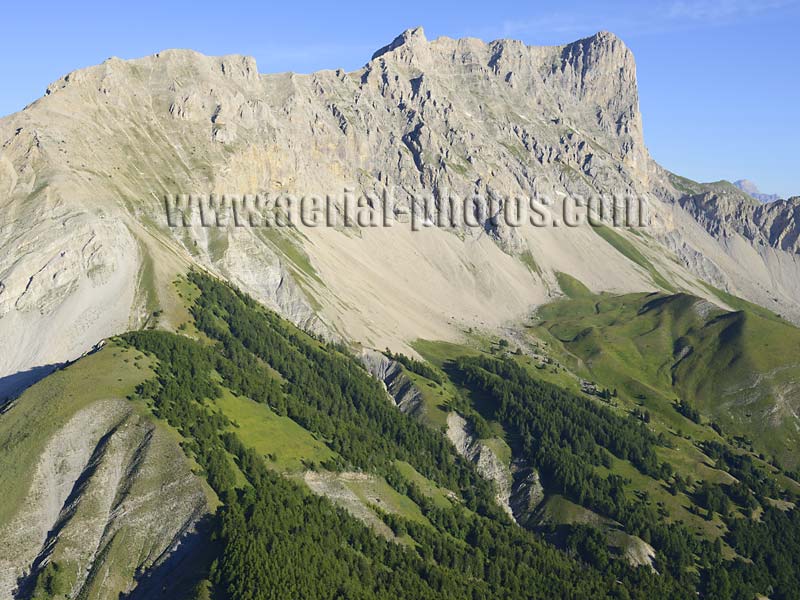 AERIAL VIEW photo of Bure Peak and its massive cliff, Dévoluy Massif, French Alps, France. VUE AERIENNE, Pic de Bure et sa falaise, Massif du Dévoluy, Alpes Françaises.