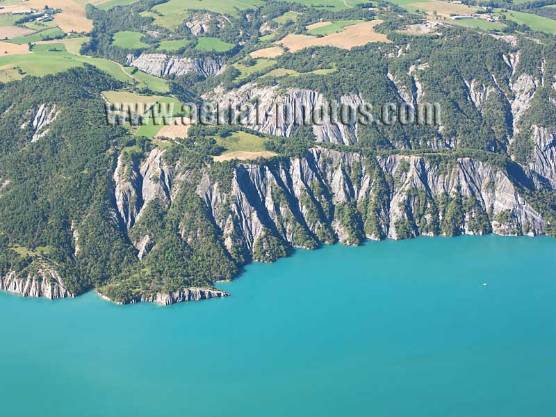 AERIAL VIEW photo of Lake Serre-Ponçon, French Alps, France. VUE AERIENNE Lac de Serre-Ponçon, Alpes Françaises.