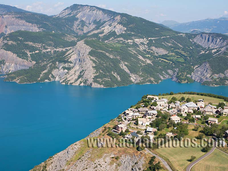 AERIAL VIEW photo of le Sauze du Lac village, Lake Serre-Ponçon, French Alps, France. VUE AERIENNE lac de Serre-Ponçon, Alpes Françaises.