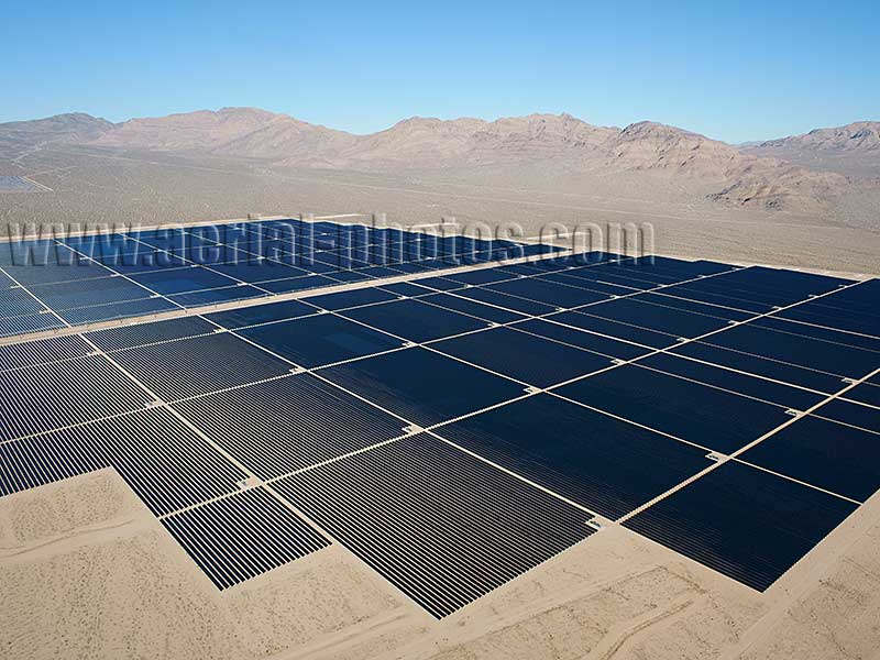 AERIAL VIEW photo of a photovoltaic power plant. renewable energy in the Mojave Desert, California, United States.