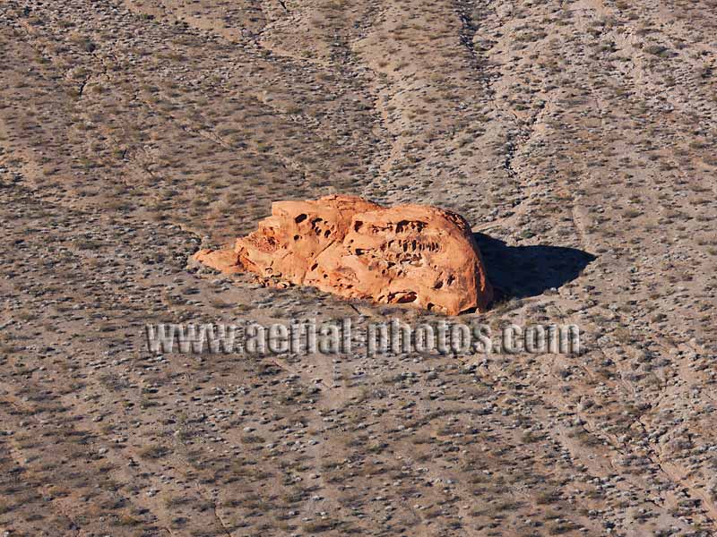 Aerial view of a small red sandstone rock, Valley of Fire State Park, Mojave Desert, Nevada, USA.