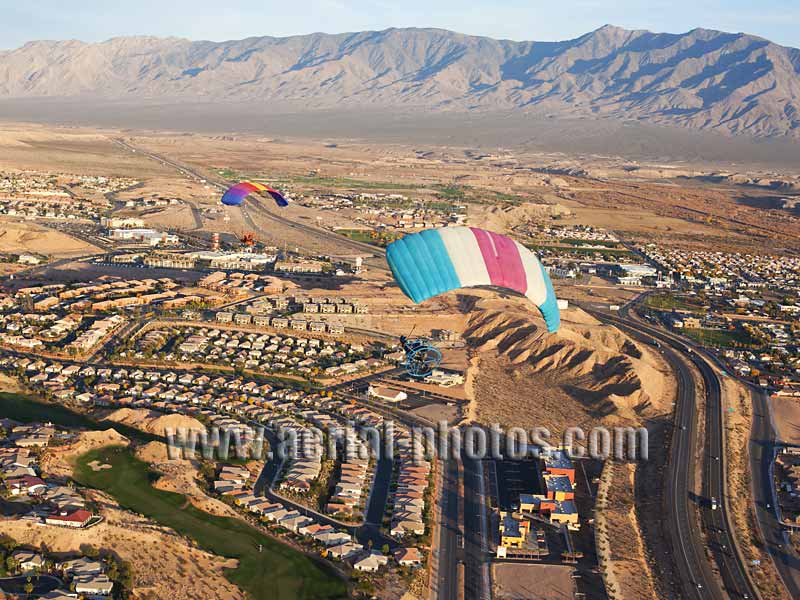 Aerial view of powered parachutes in flight, paramotor, Mesquite, Nevada, USA.